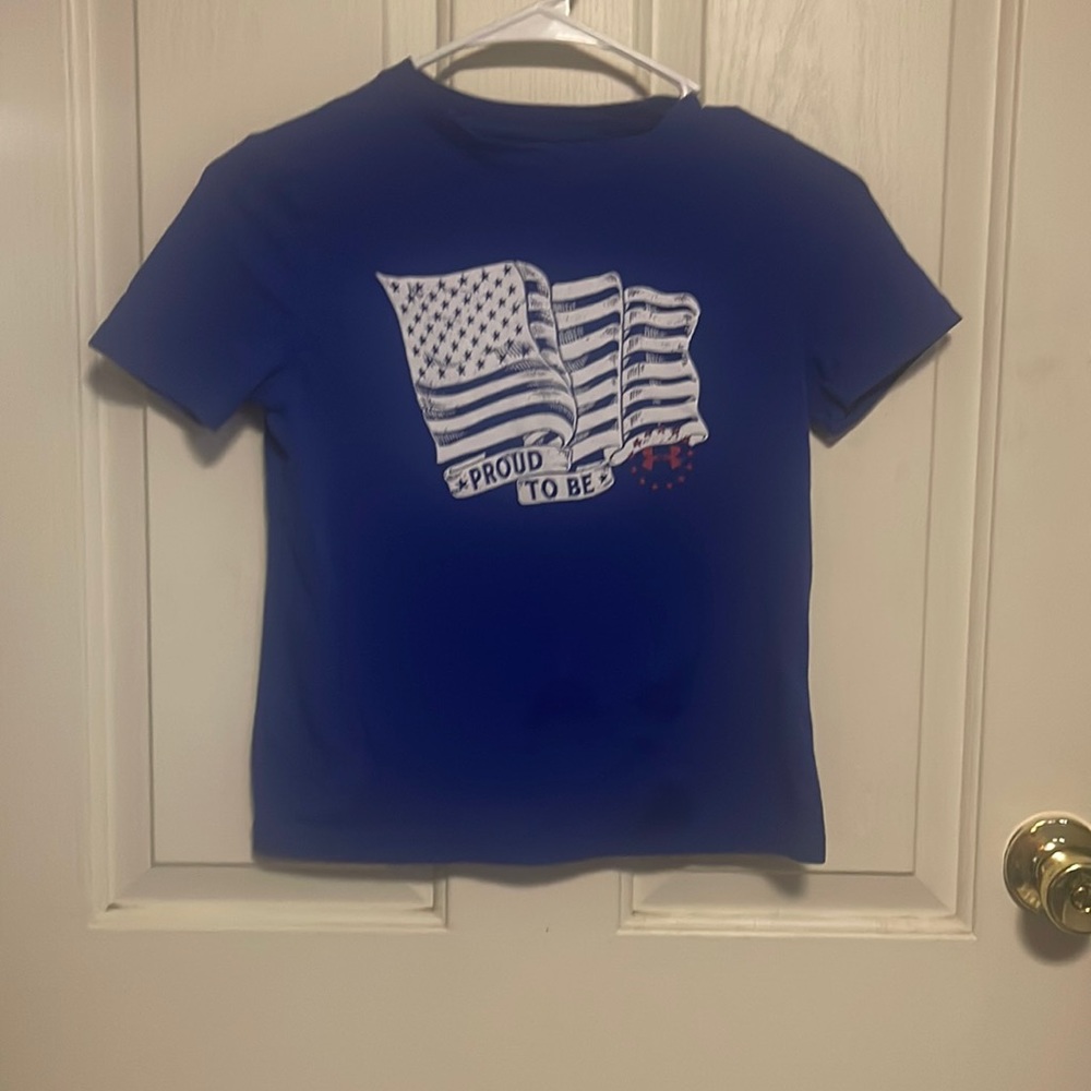 Under Armour youth small small spot on front bottom see pictures